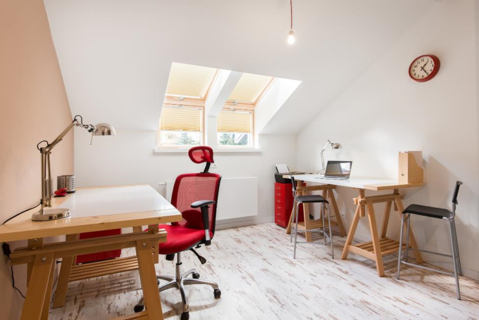 An attic repurposed as a home office
